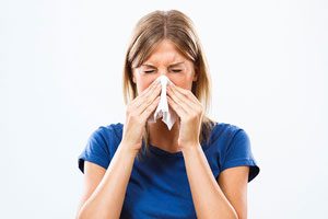 a person blowing their nose Bradenton FL